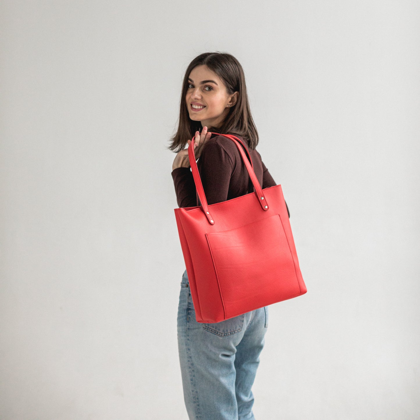 Red leather tote bag