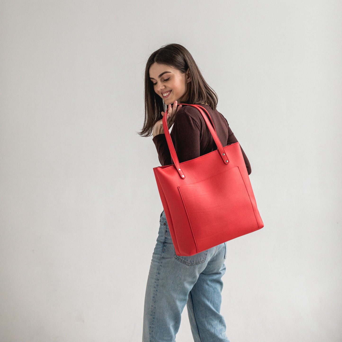 Red leather tote bag