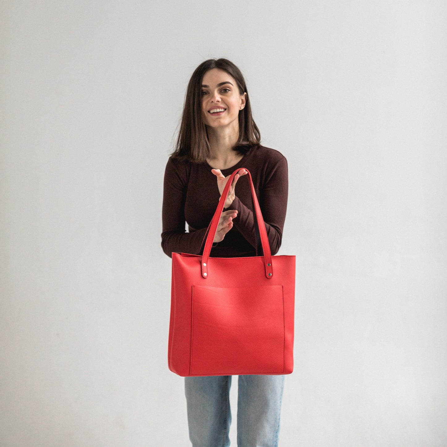 Red leather tote bag