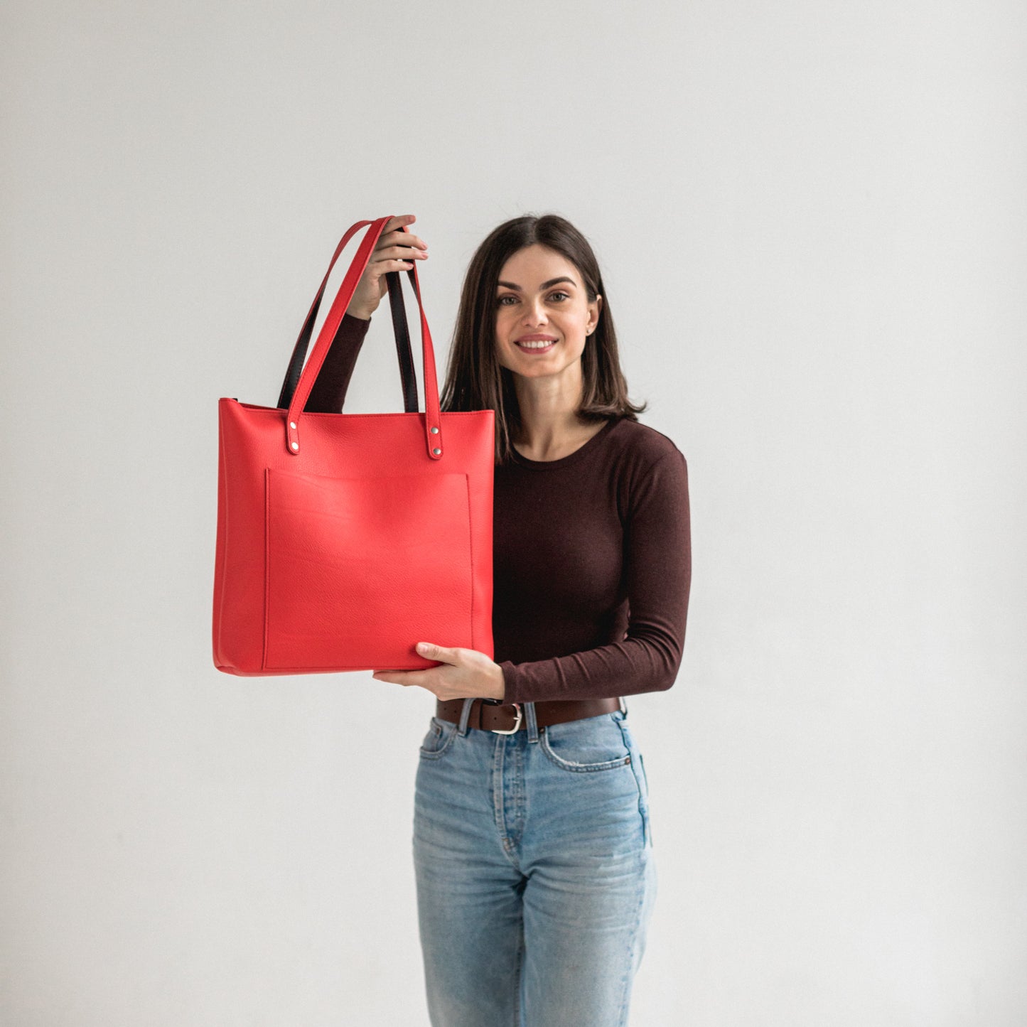 Red leather tote bag