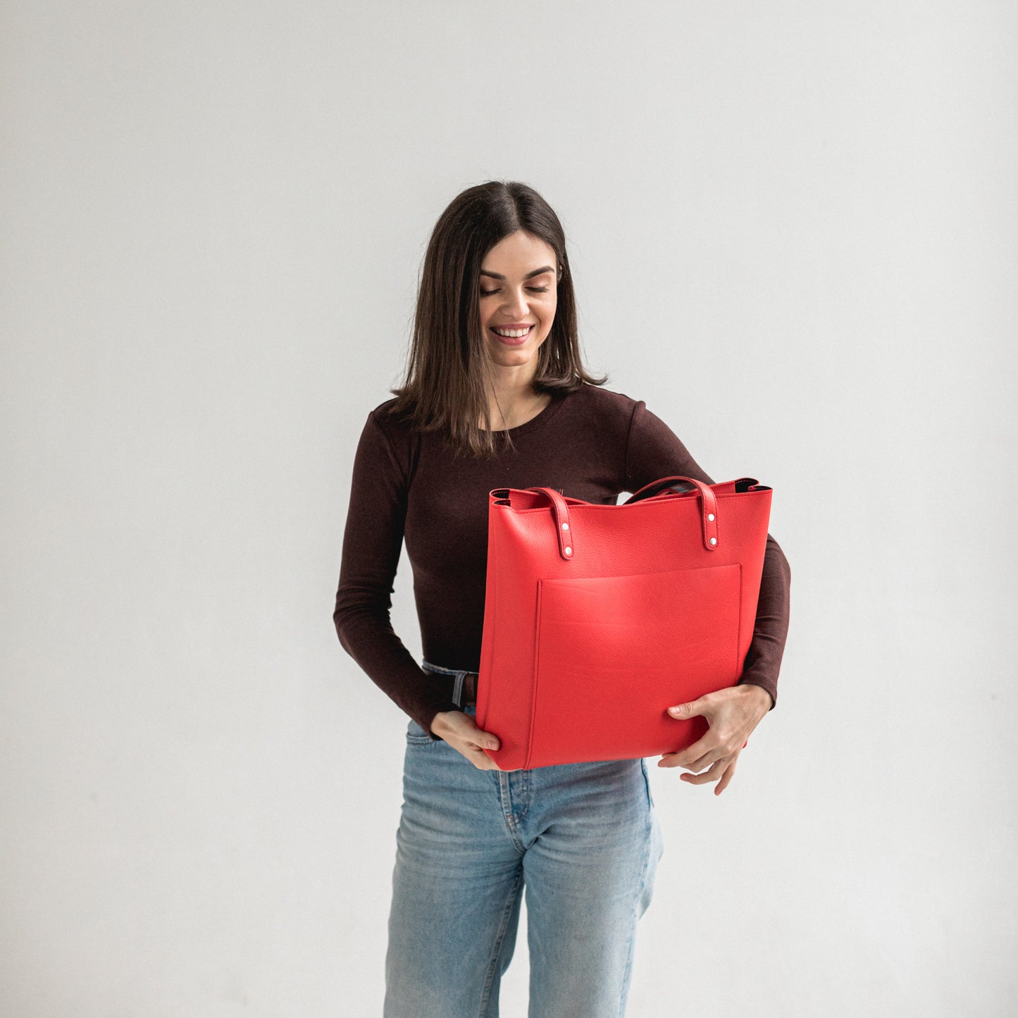 Red leather tote bag