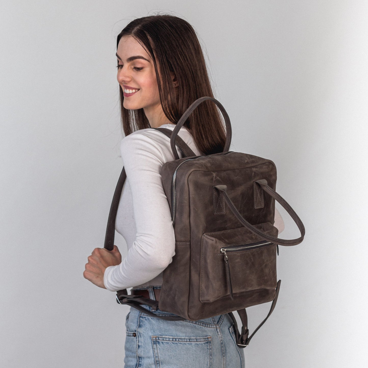 Gray leather city backpack