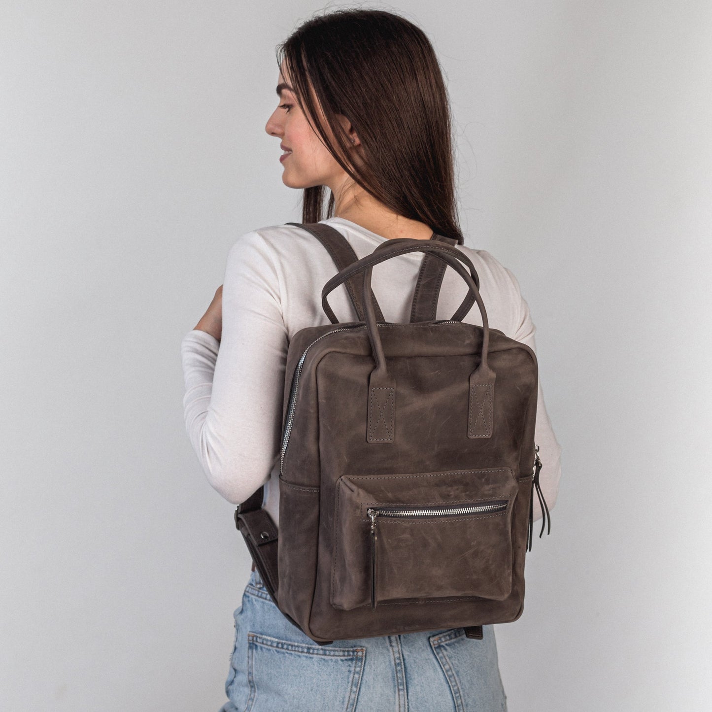 Gray leather city backpack