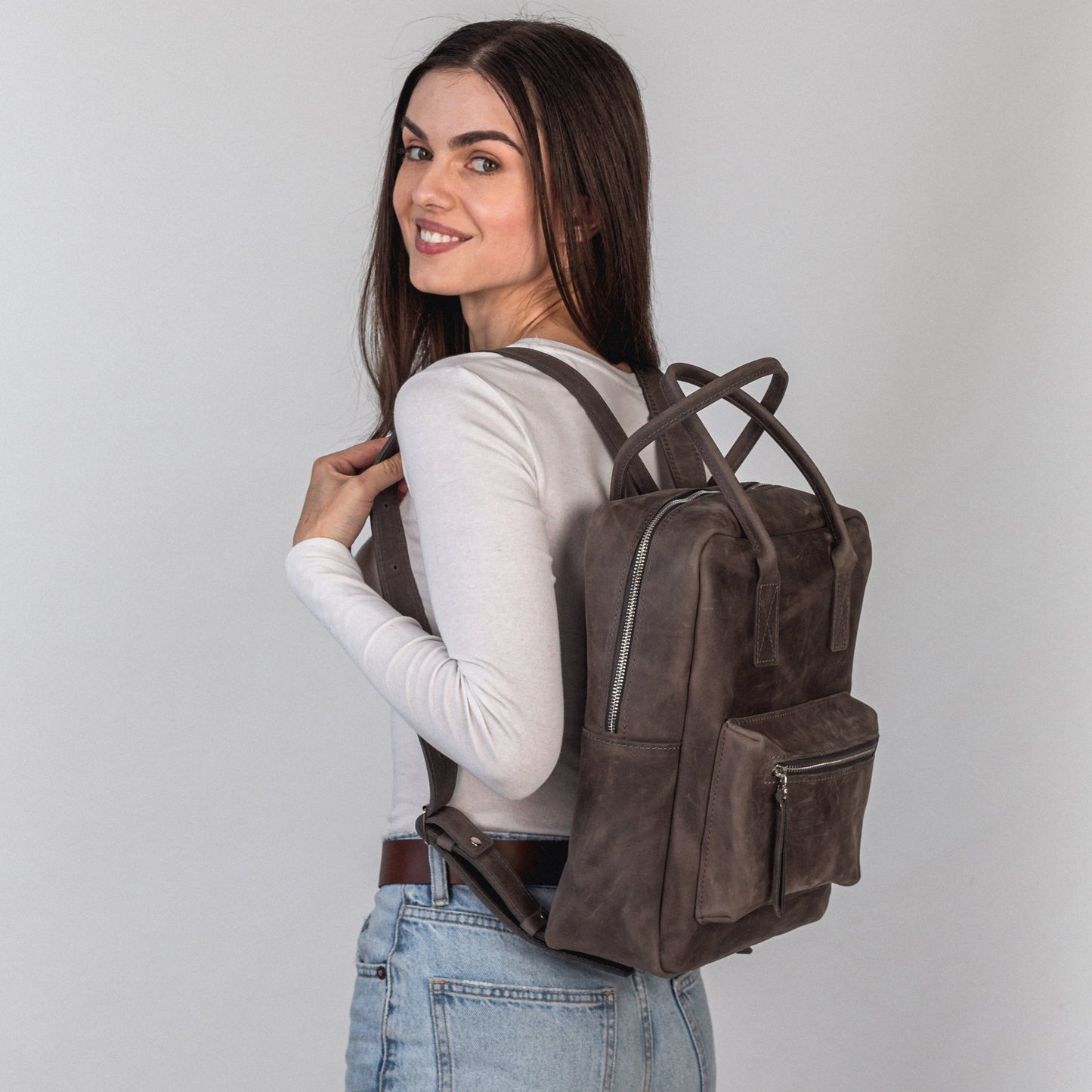 Gray leather city backpack