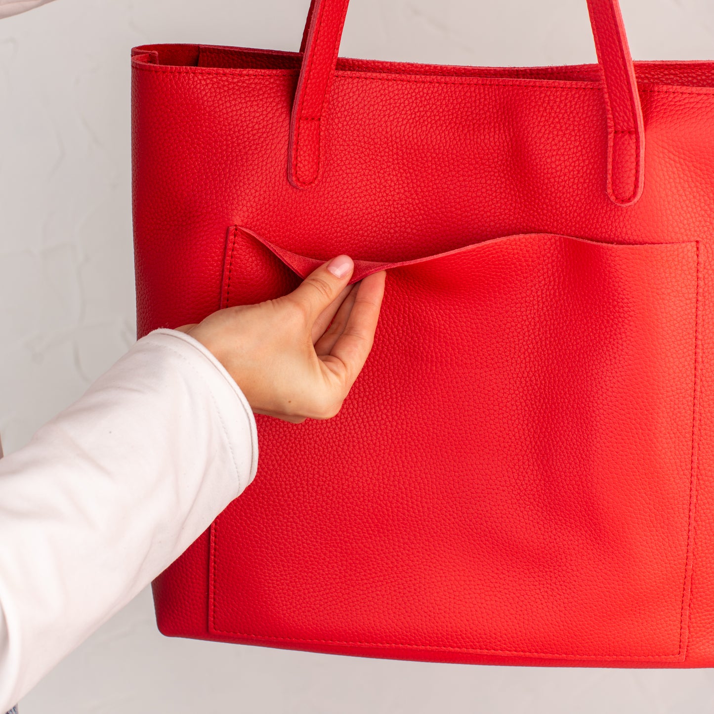 Red pebbled leather tote bag