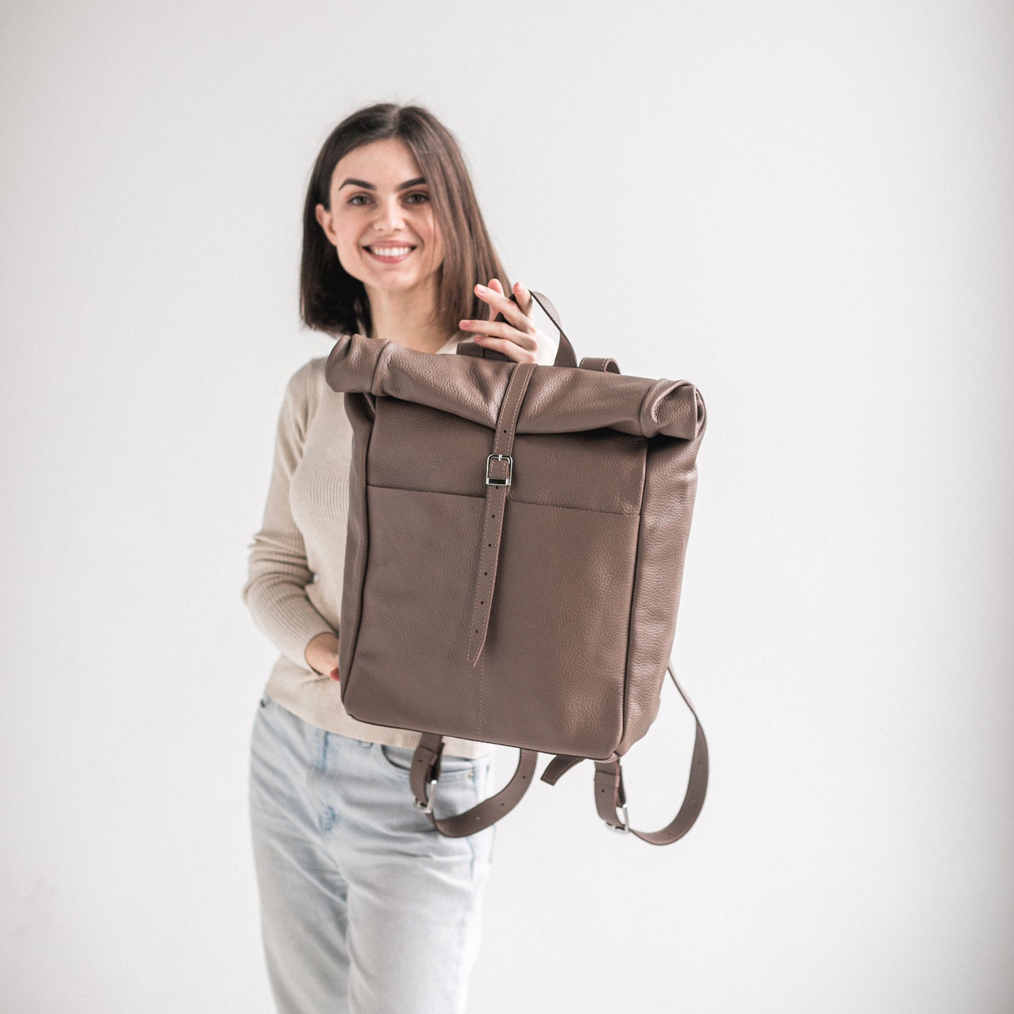 Latte pebbled leather roll-top backpack