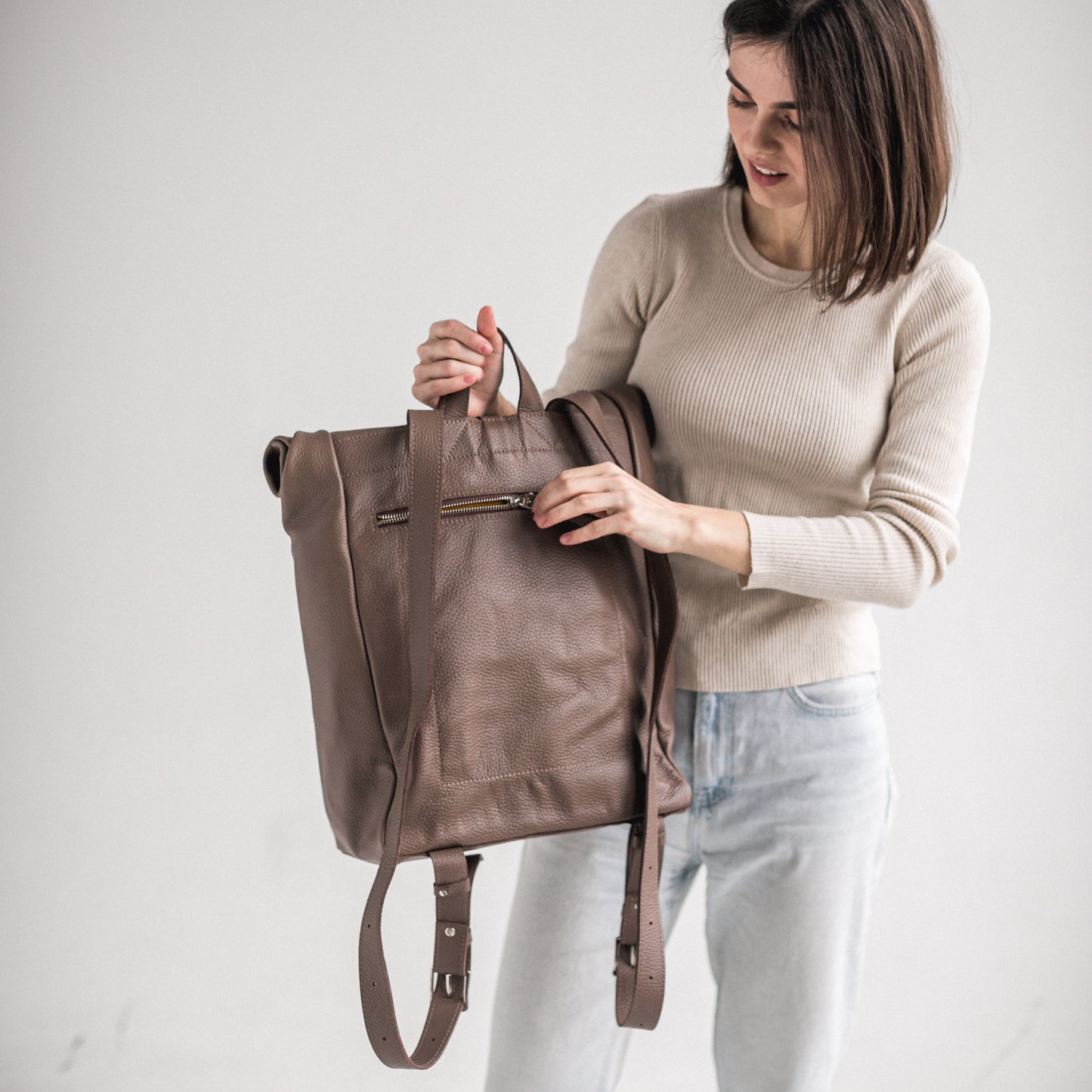 Latte pebbled leather roll-top backpack