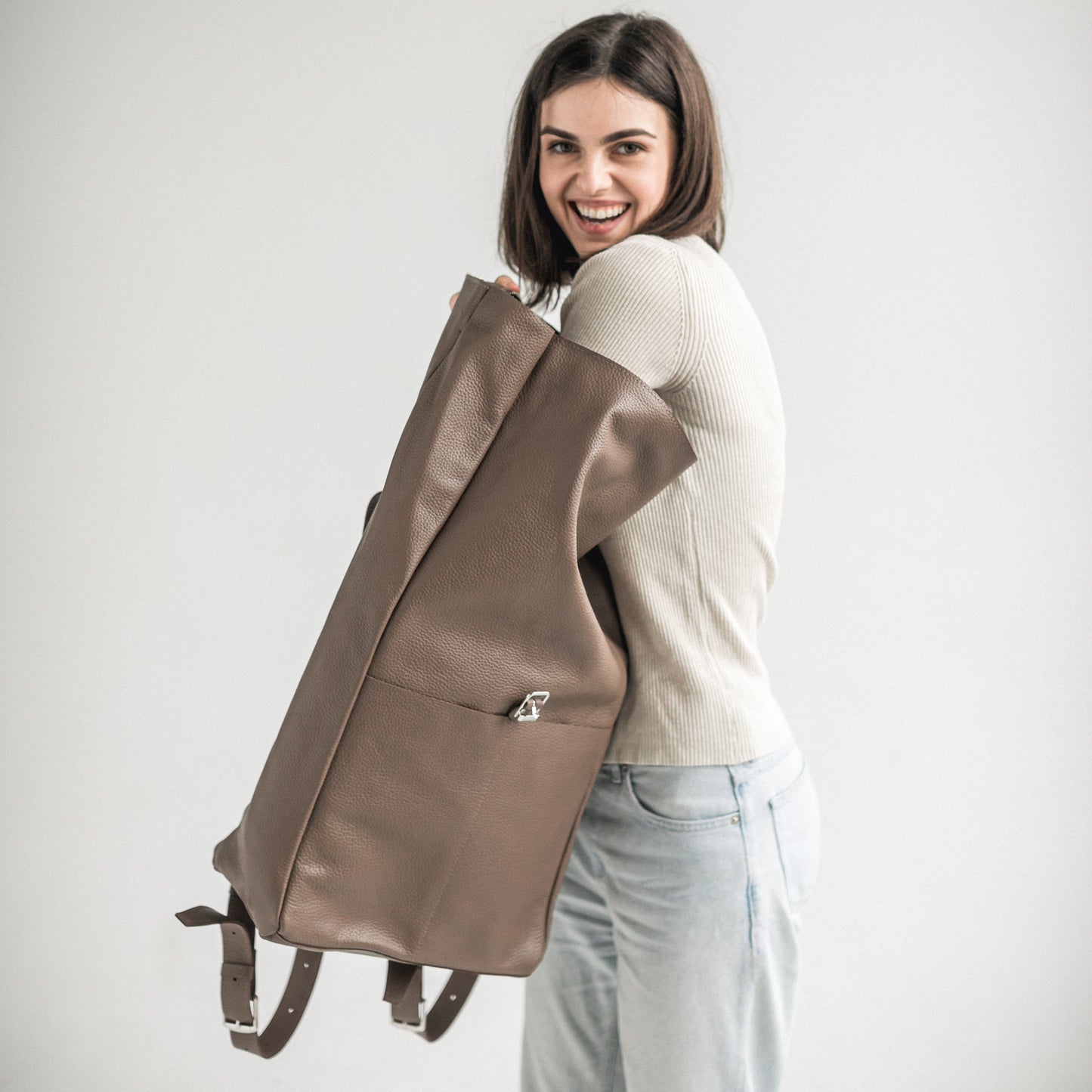 Latte pebbled leather roll-top backpack