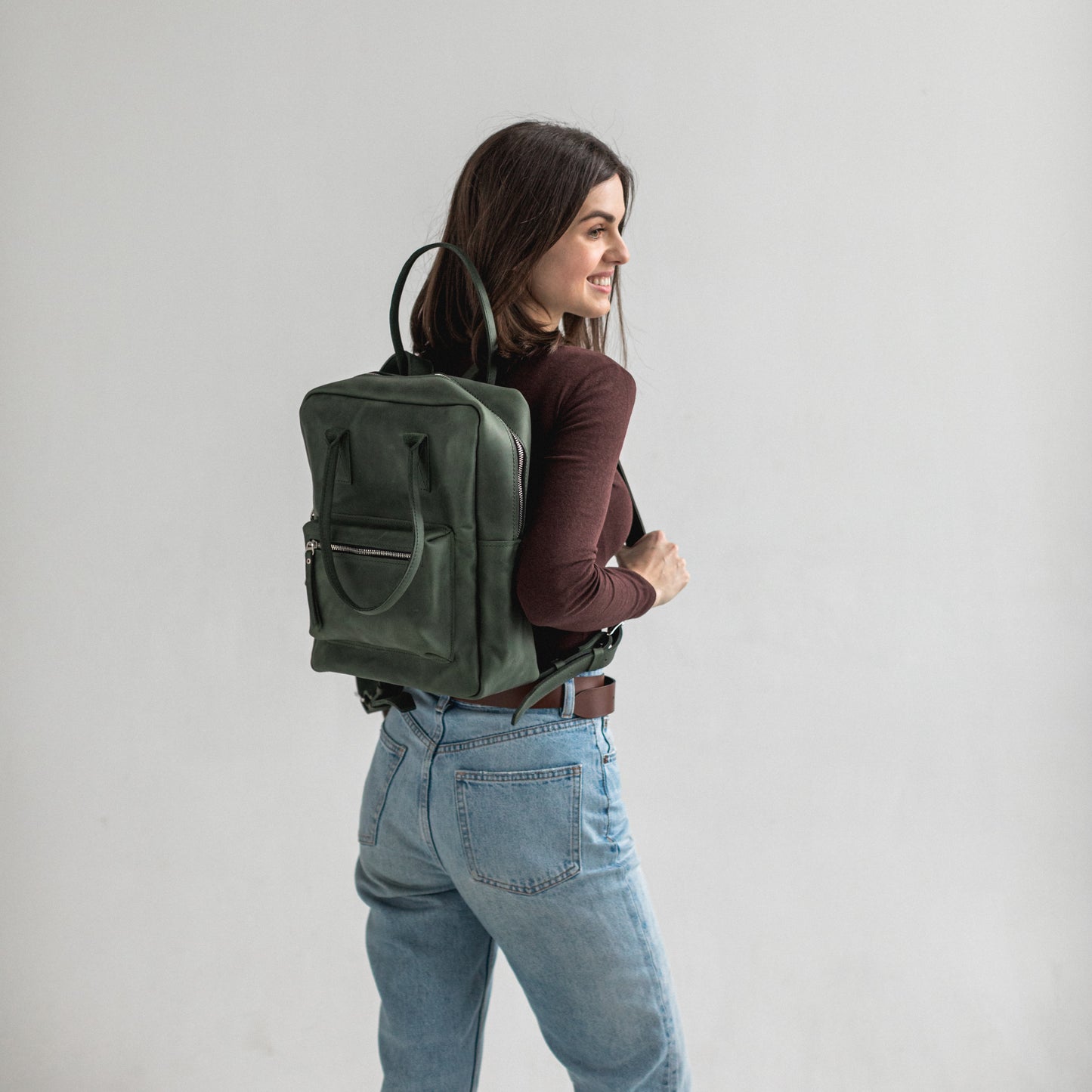 Green leather city backpack