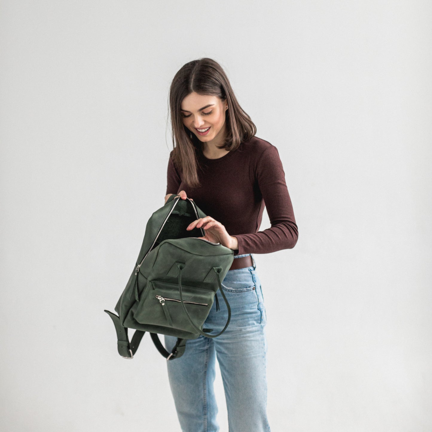 Green leather city backpack