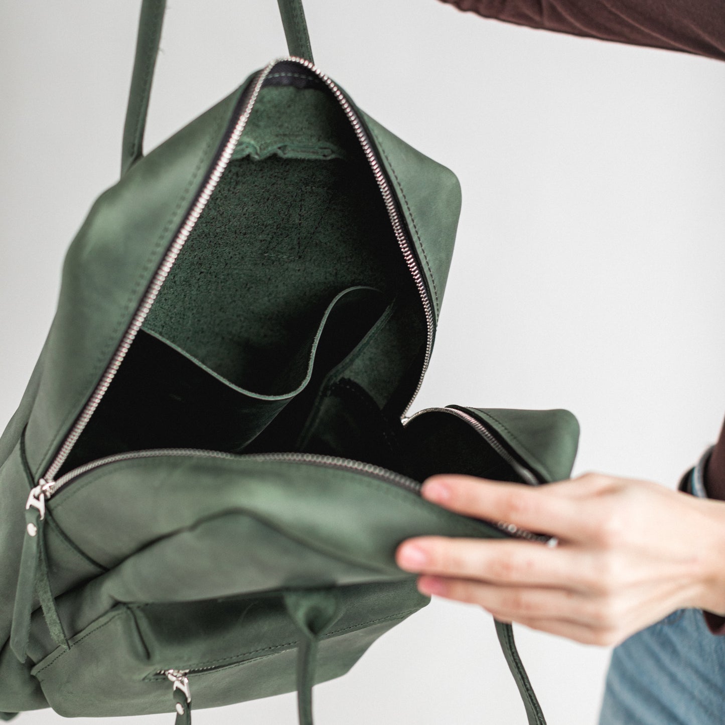 Green leather city backpack