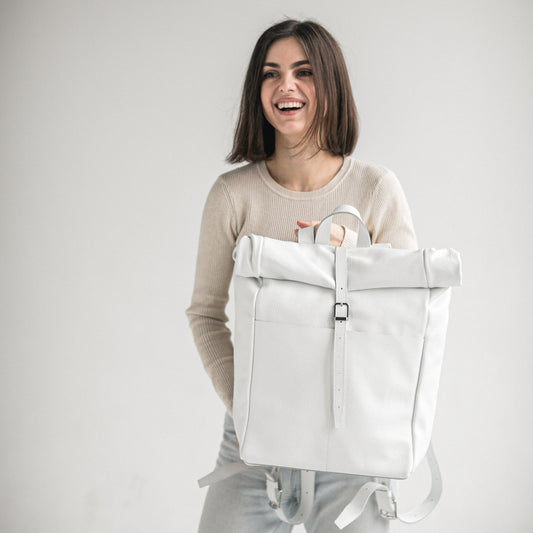 White pebbled leather roll-top backpack
