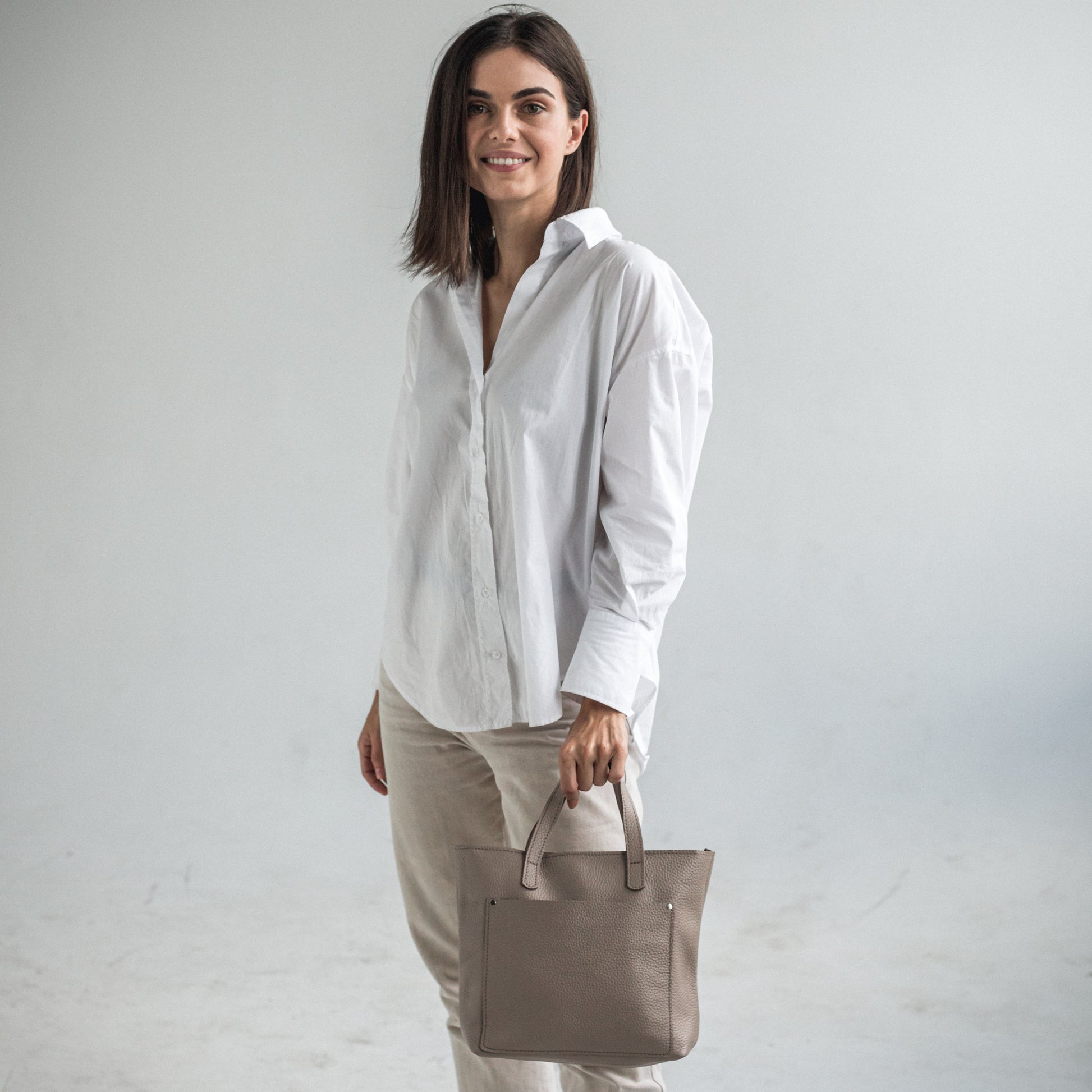 Leather mini tote bag with outside pocket 