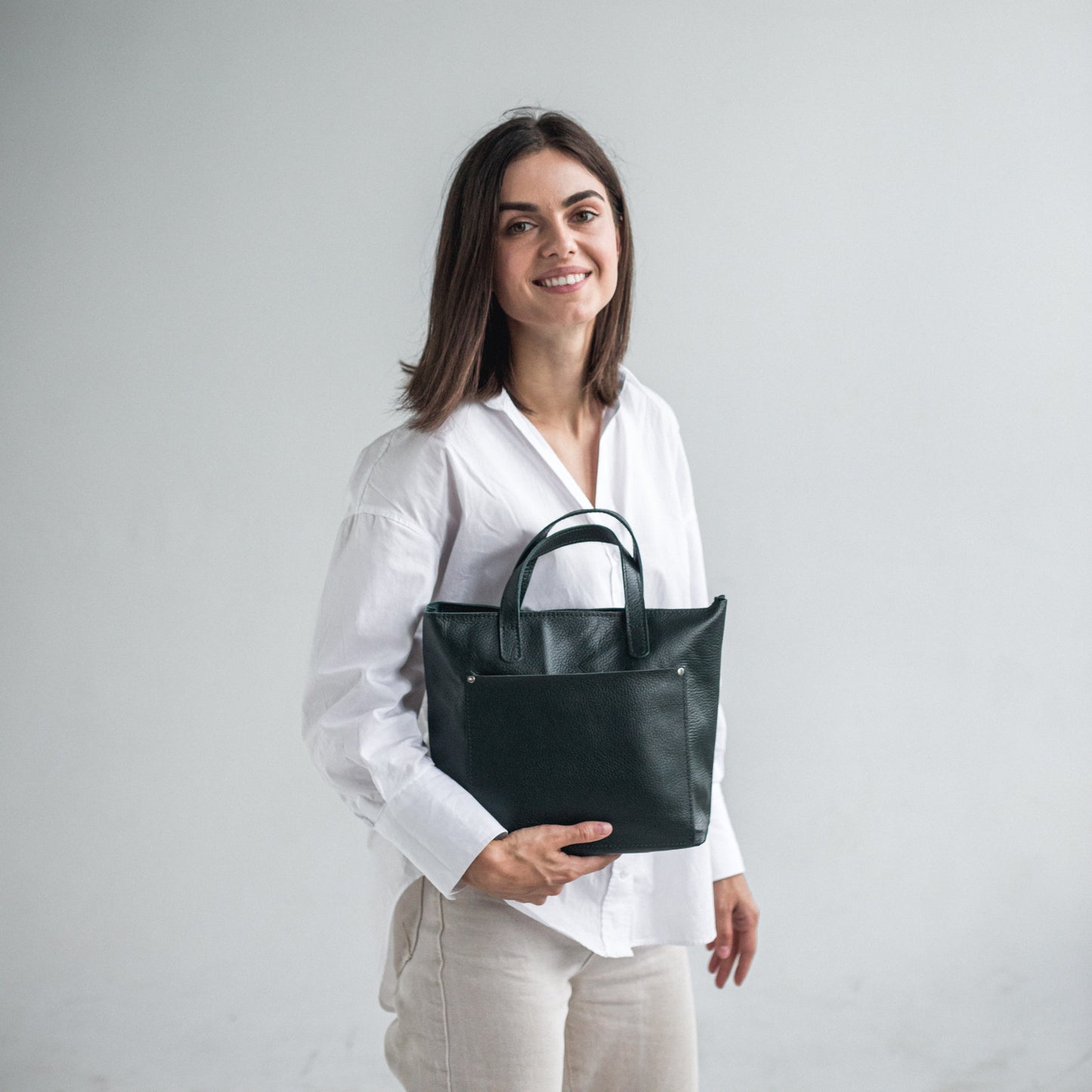 Green pebbled leather mini tote bag