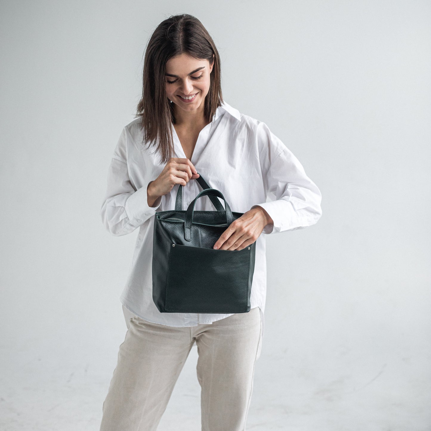 Green pebbled leather mini tote bag