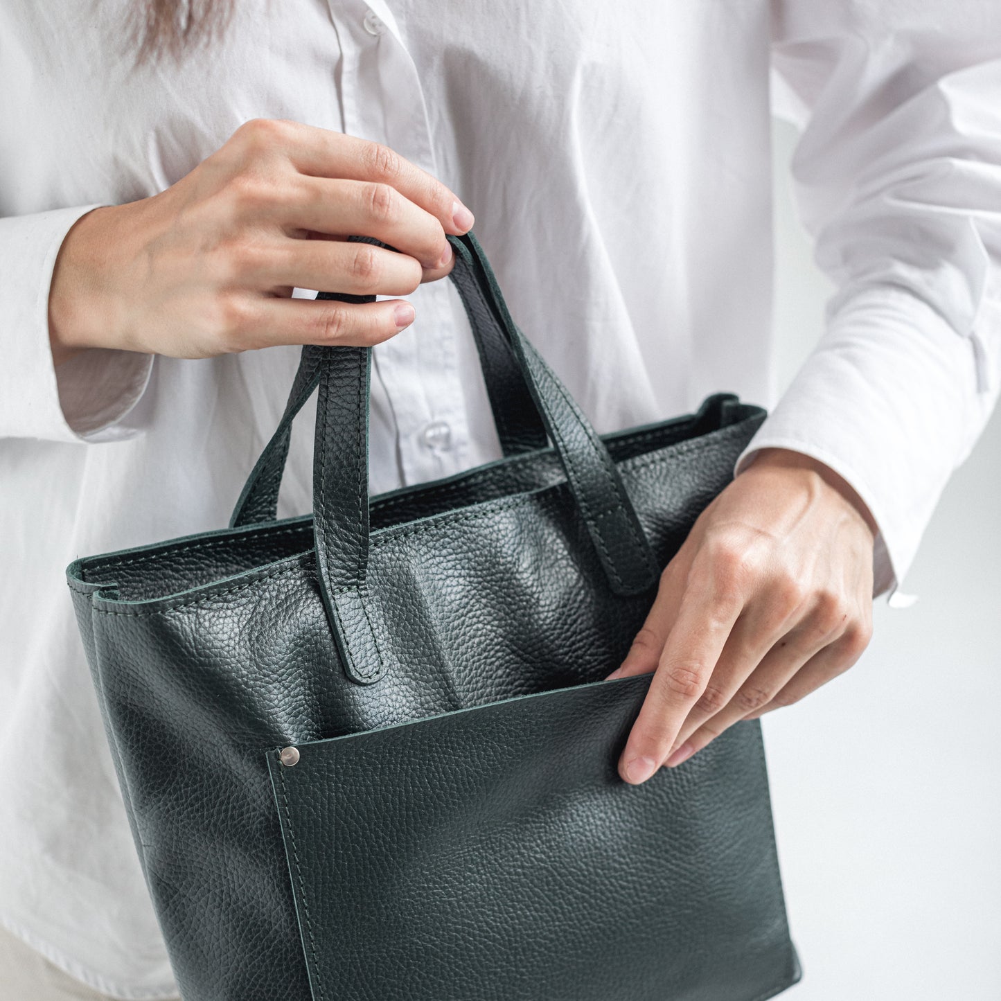 Green pebbled leather mini tote bag