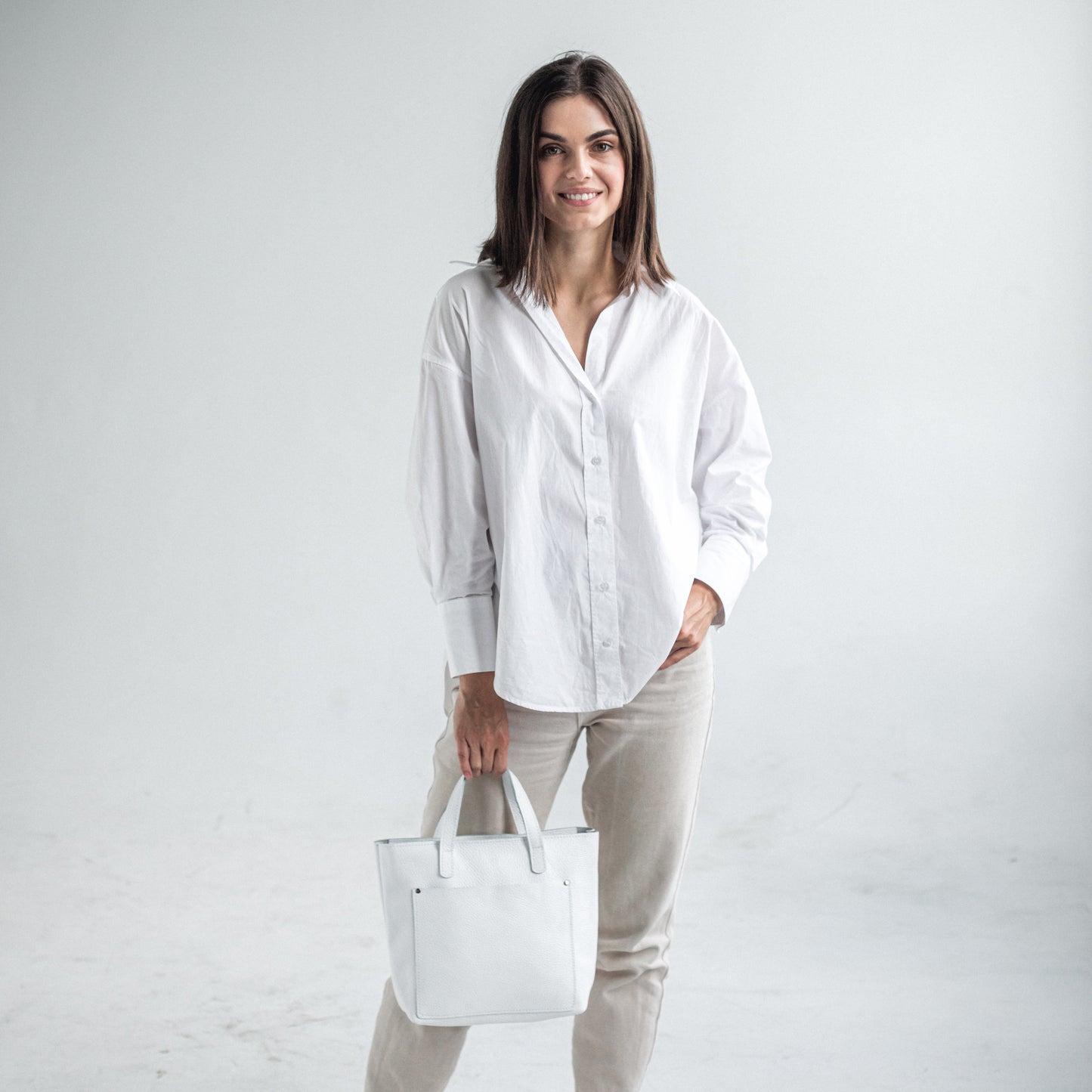 White pebbled leather mini tote bag