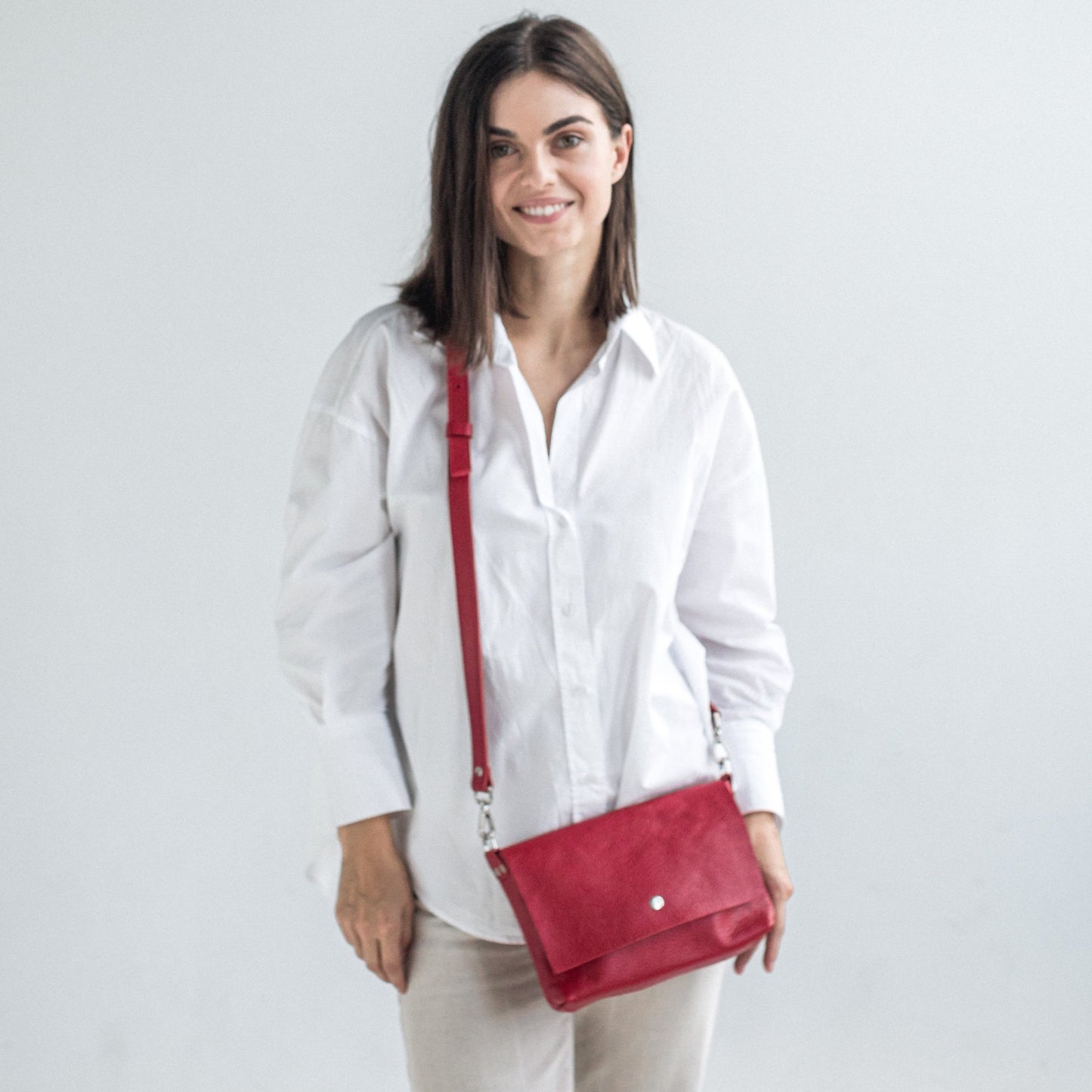 Red pebbled leather crossbody bag