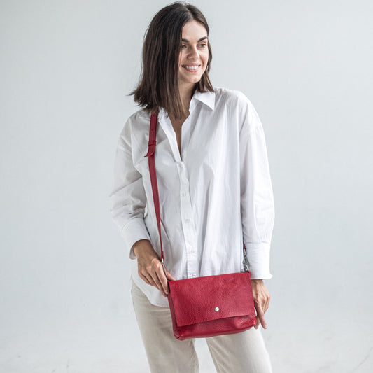 Red pebbled leather crossbody bag