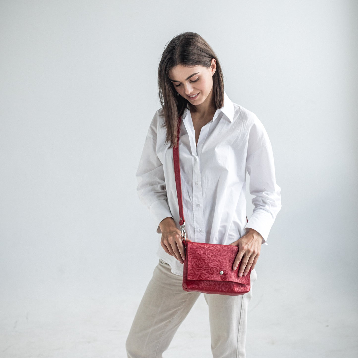 Red pebbled leather crossbody bag