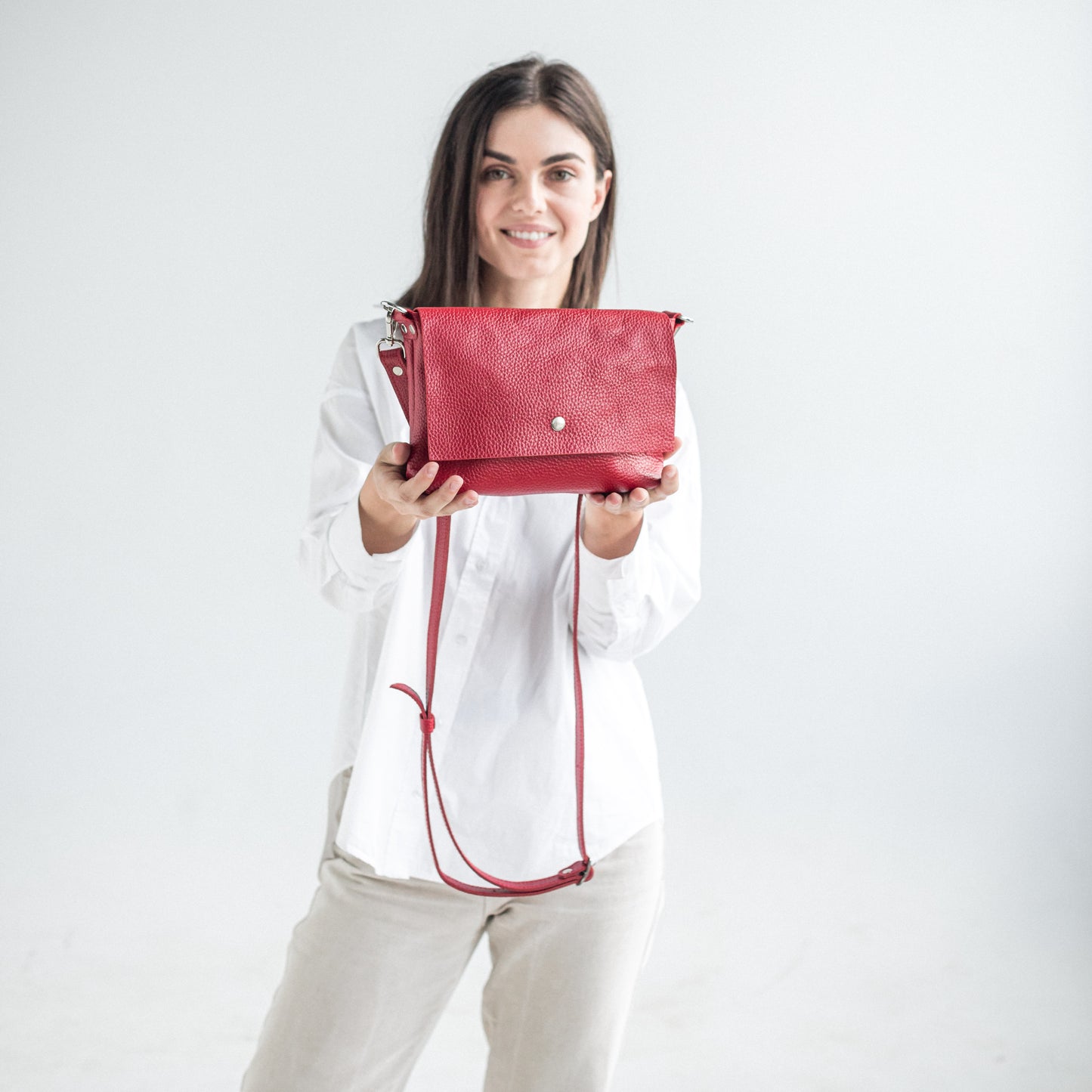 Red pebbled leather crossbody bag