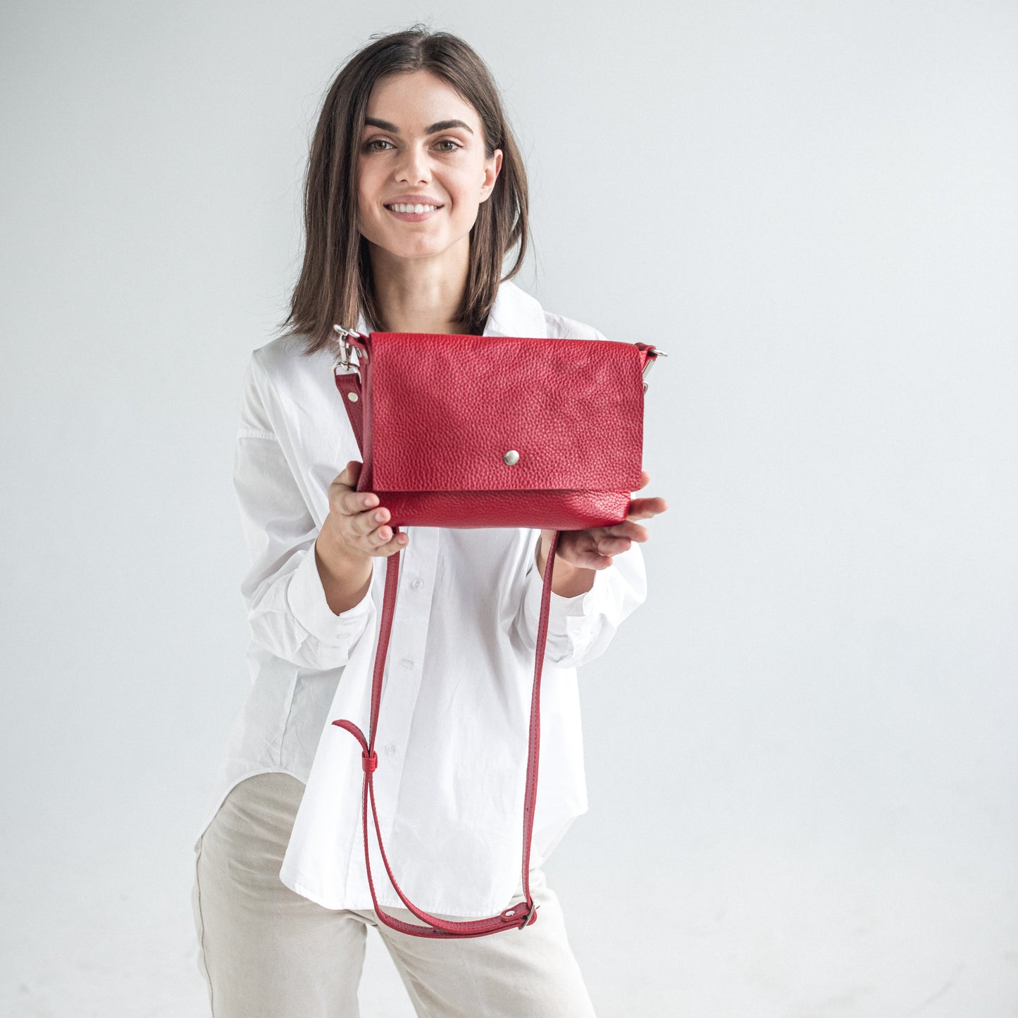 Red pebbled leather crossbody bag