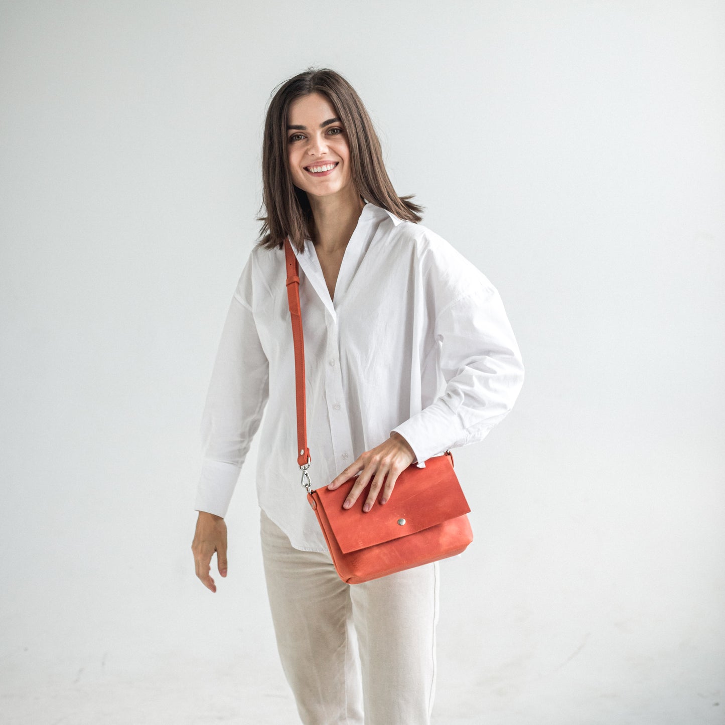 Orange leather crossbody bag