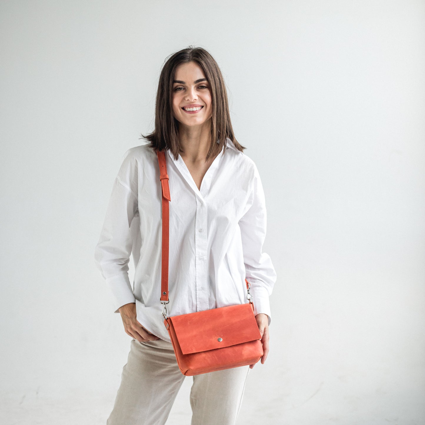 Orange leather crossbody bag