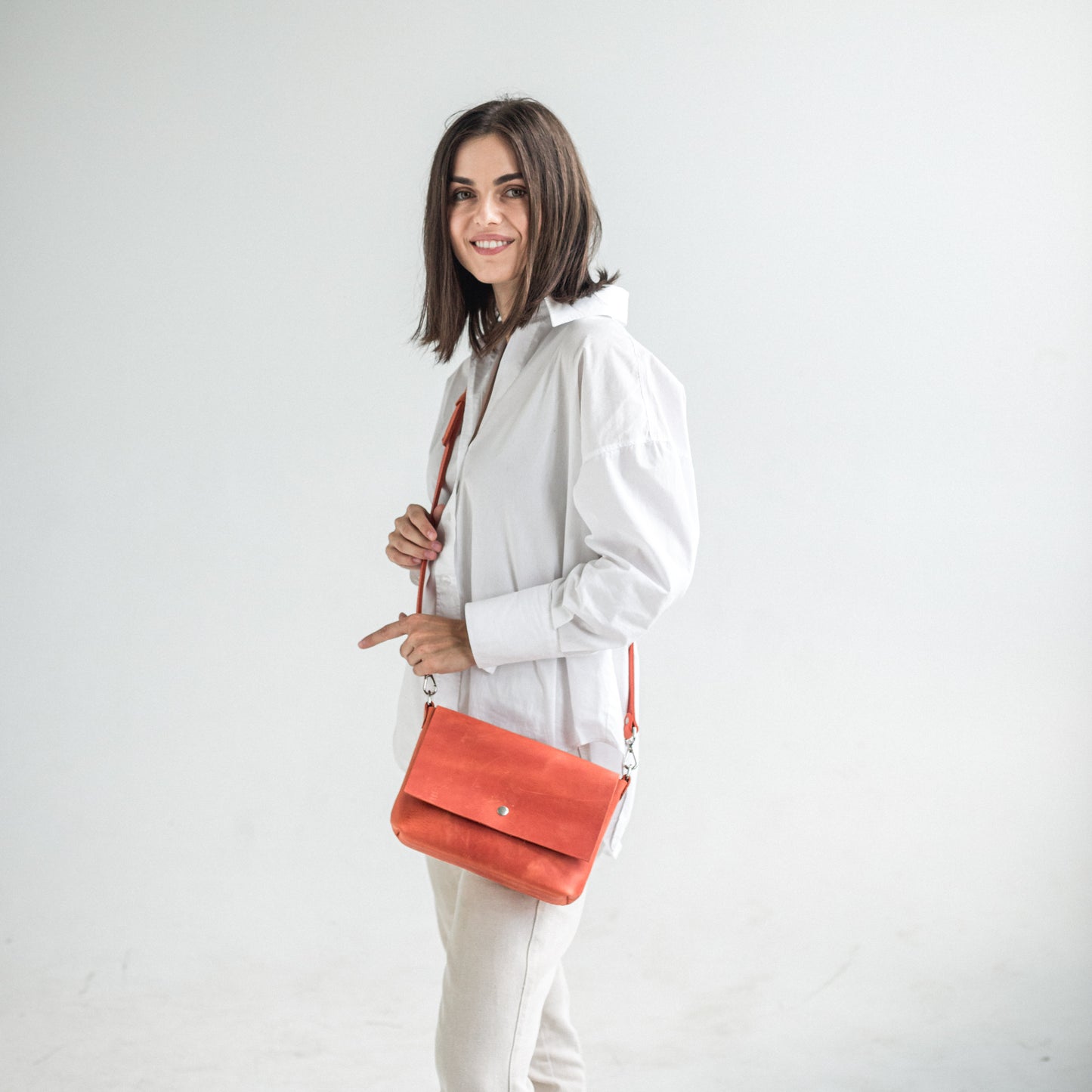 Orange leather crossbody bag