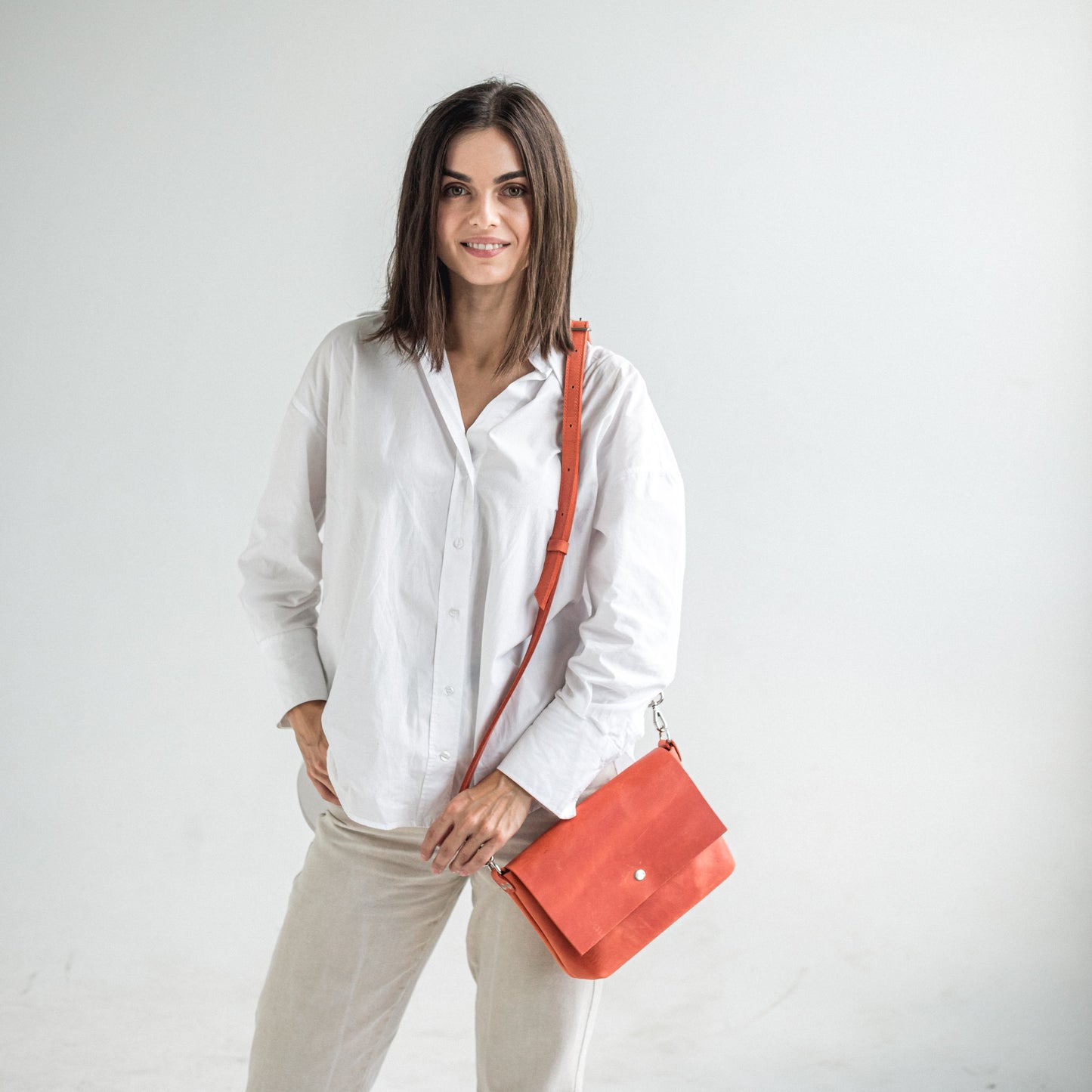 Orange leather crossbody bag