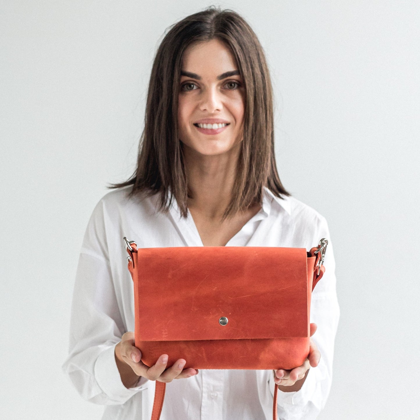 Orange leather crossbody bag