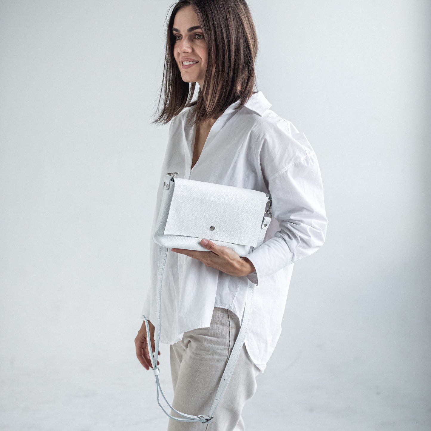 Leather white pebbled leather crossbody bag 