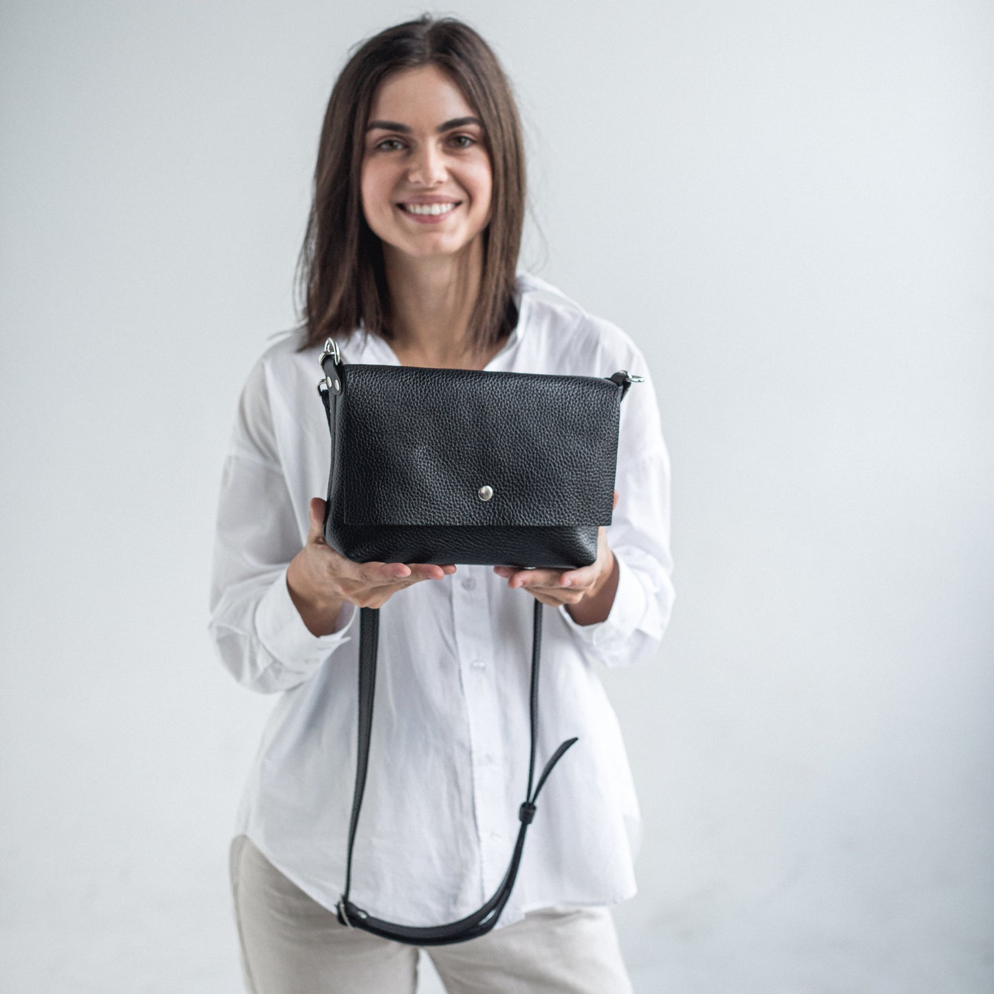 Black pebbled leather crossbody bag